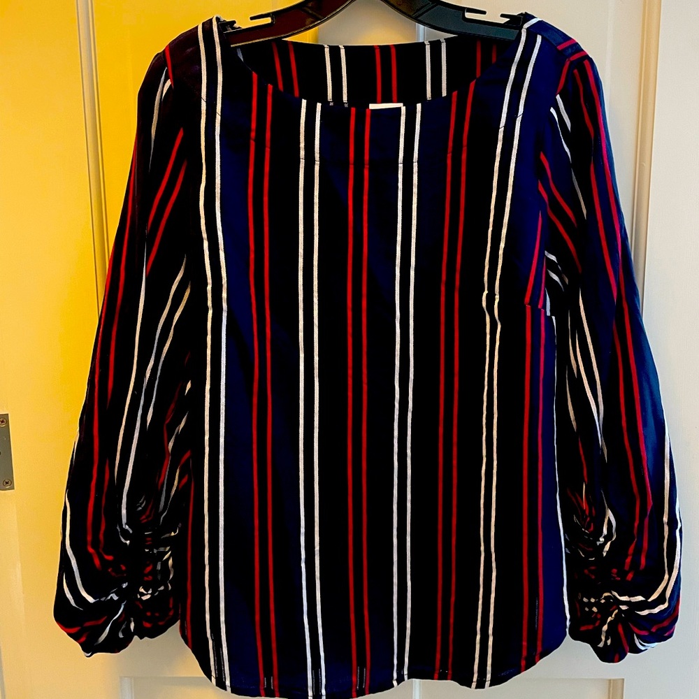 Cabi Navy bubble sleeve top with red and white strips.